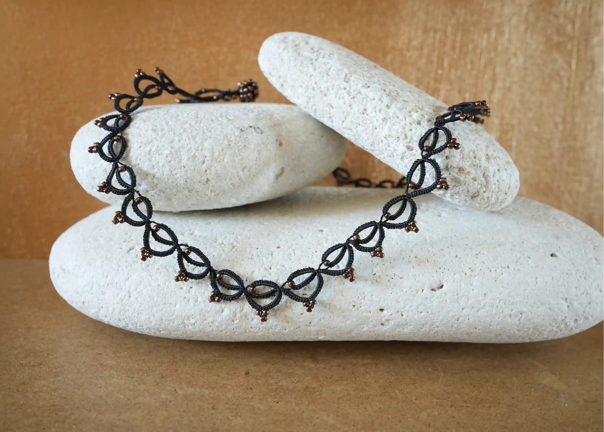 Handmade choker necklace made of thread and beads, Lotus Chain in black, Karawan brand