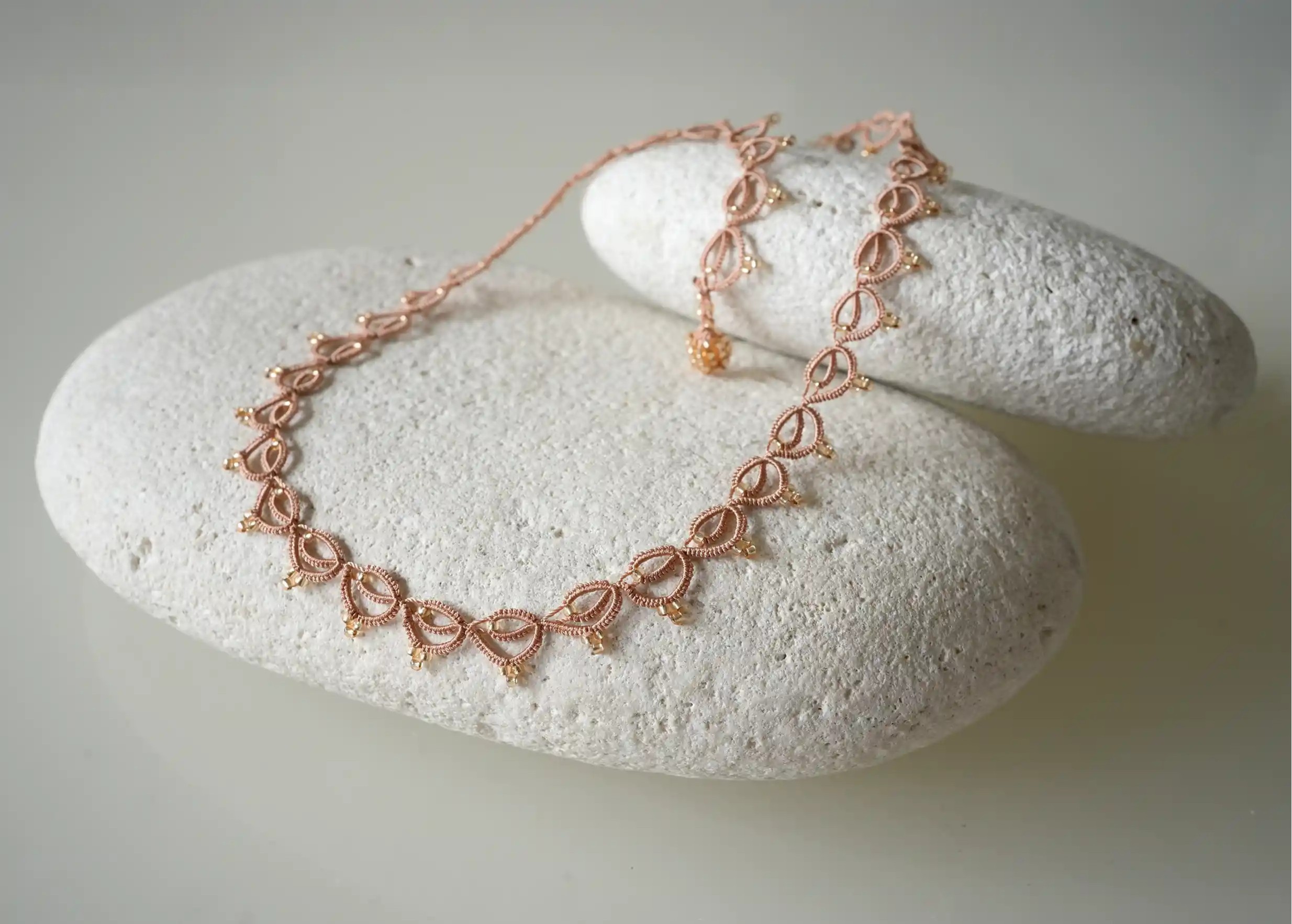 Handmade choker necklace made from thread and beads, Lotus Chain in terracotta and gold colours