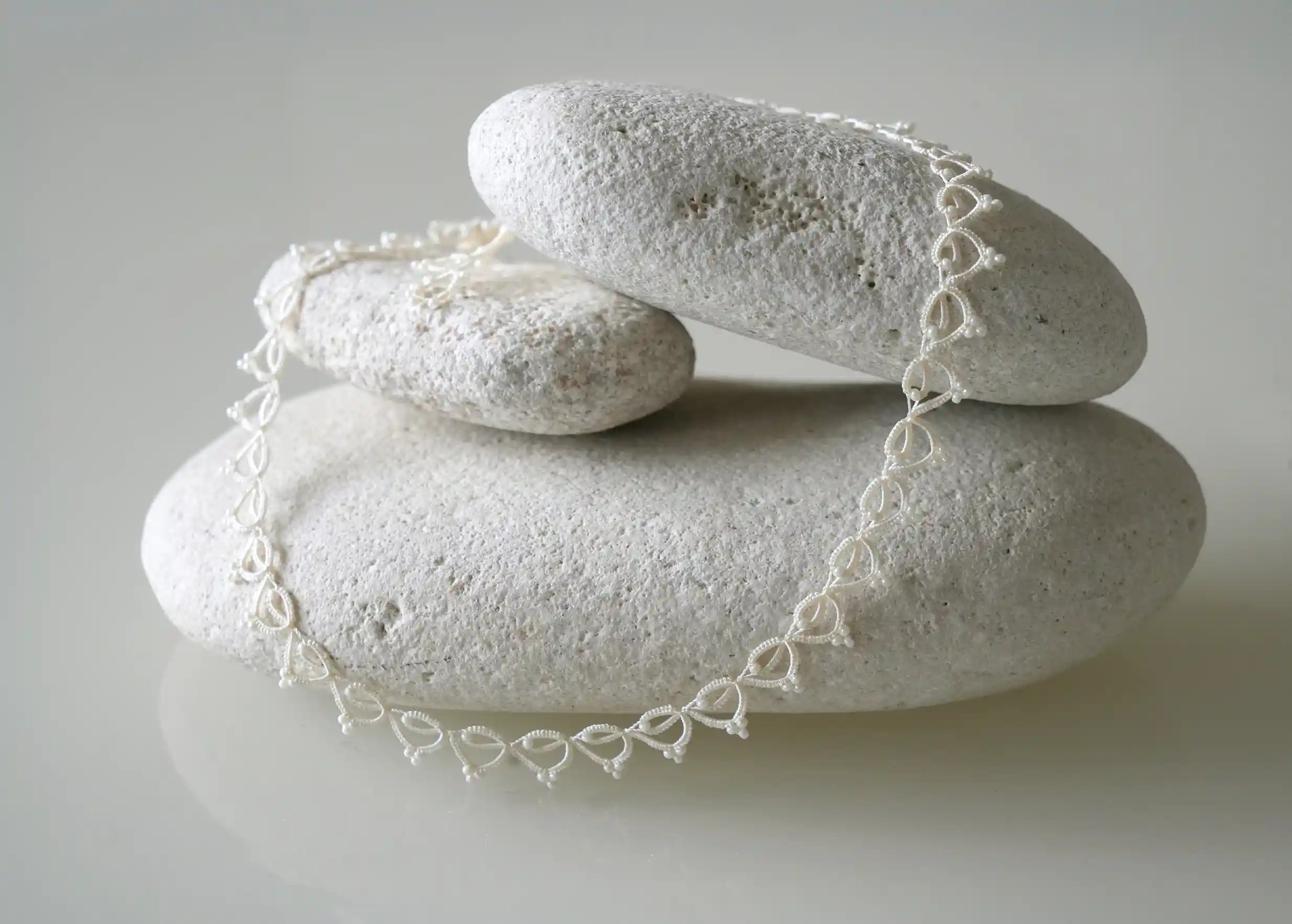 Handmade choker necklace made of thread and beads, Lotus Chain in light ivory colour