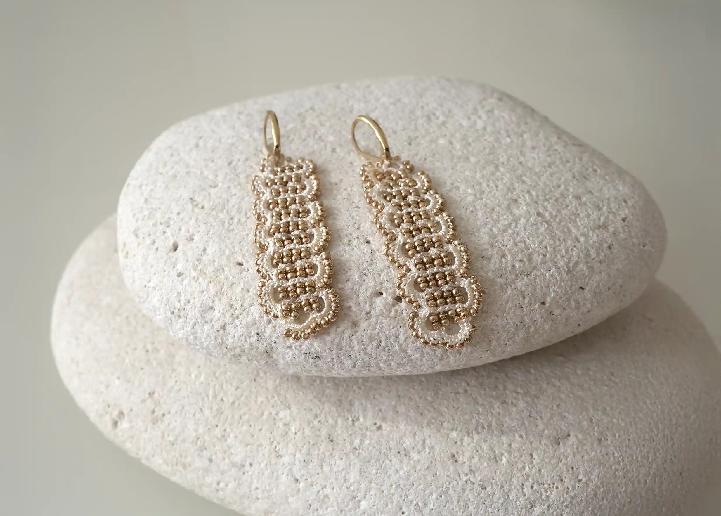 Designer earrings with wire and metallic beads, Bark model, ivory and shiny gold colours