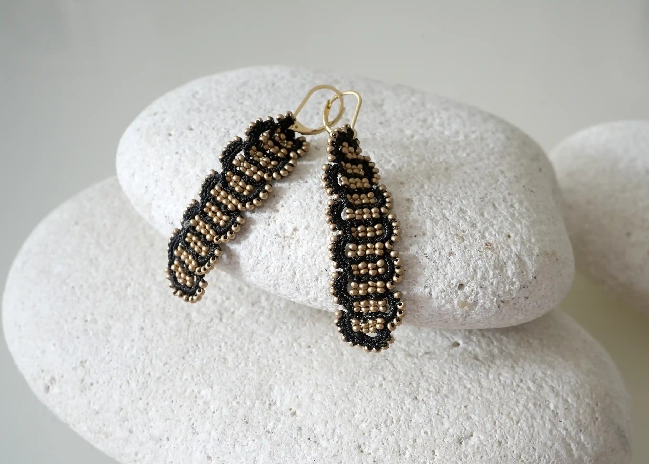 Designer earrings with wire and metallic beads, Bark model, black and shiny gold colours