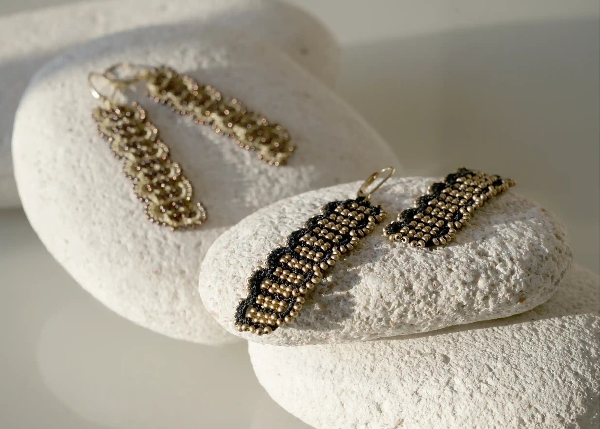 Pairs of designer earrings with wire and metallic beads, Bark model.