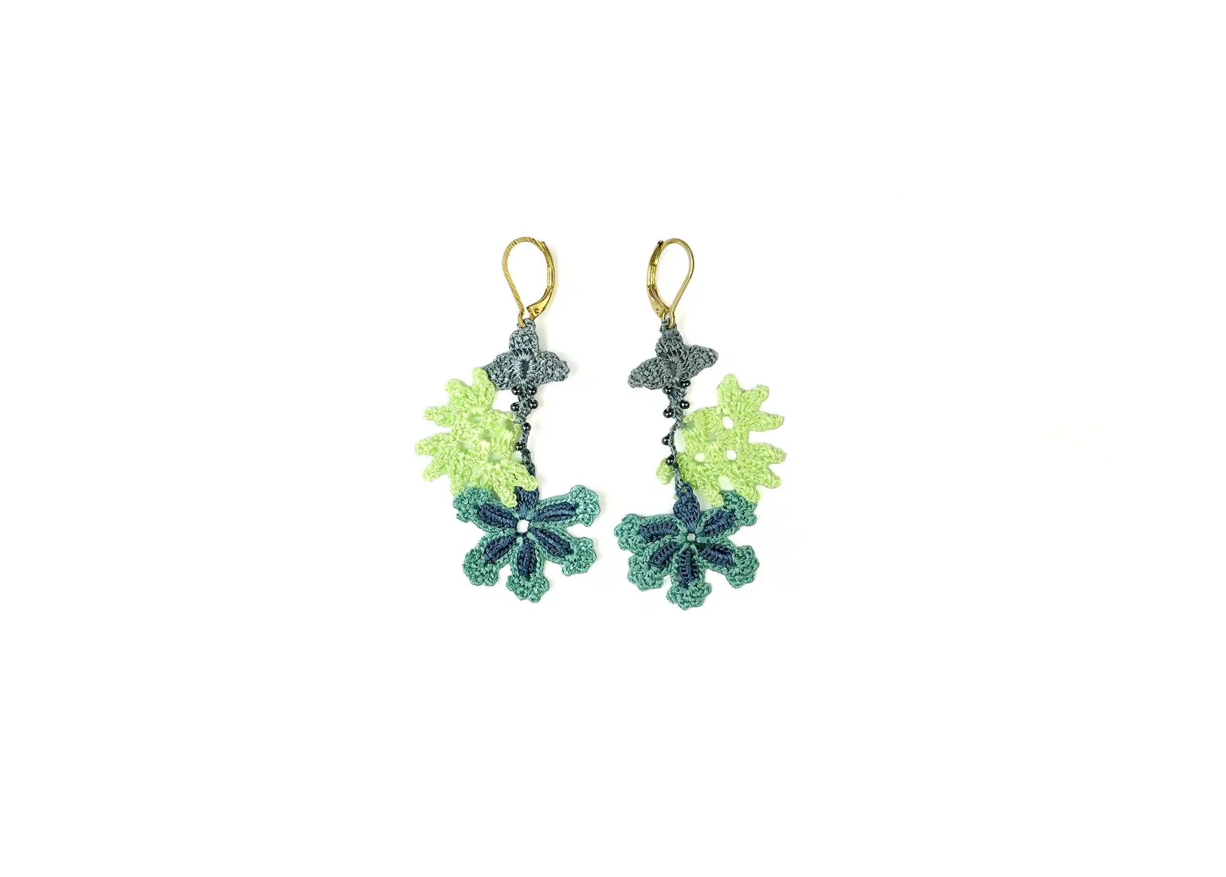 Thread lace and pearl earrings, ocean colour, photo taken against a white background