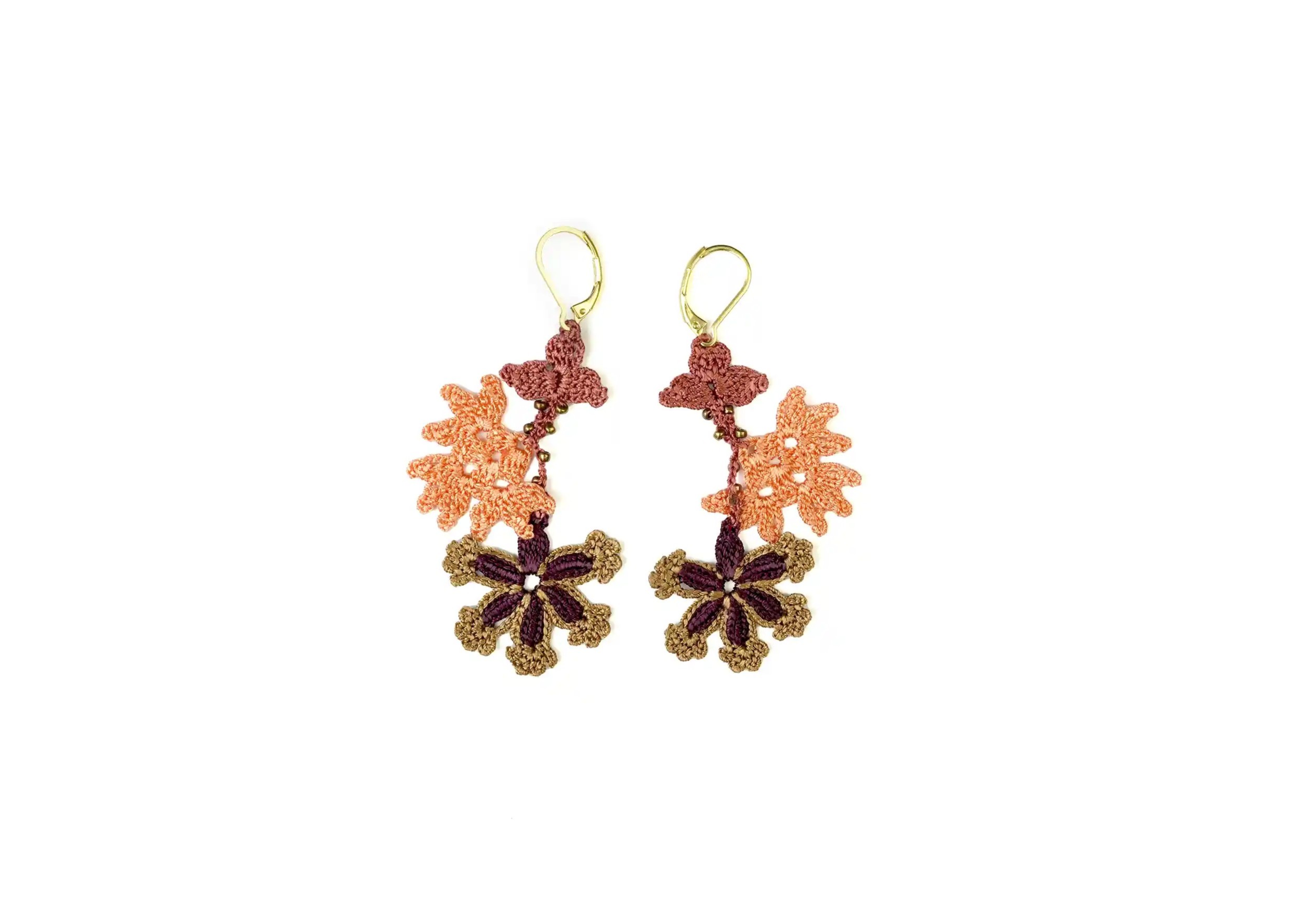 Thread lace and pearl earrings, woody colour, photo taken against a white background