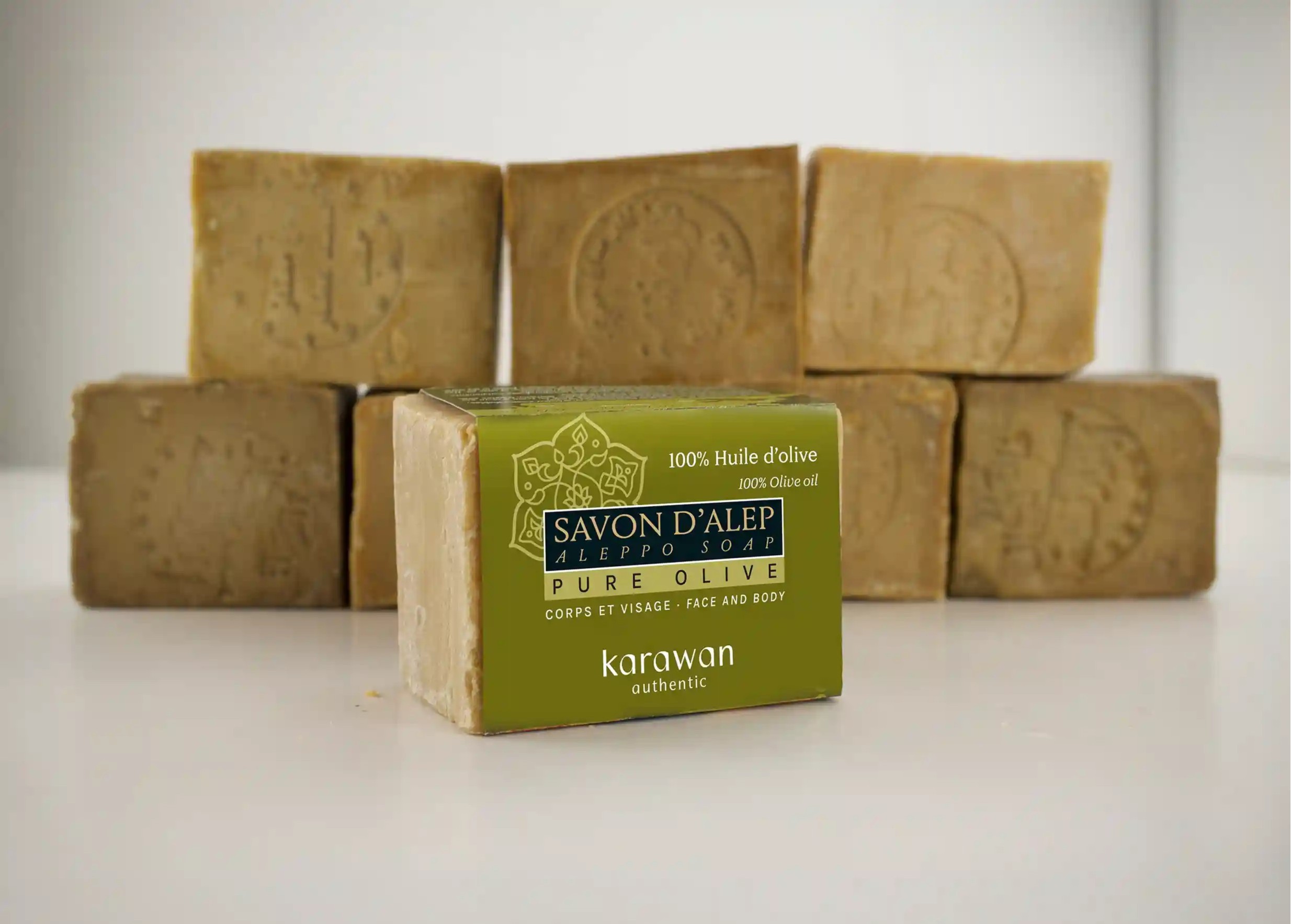 Aleppo soap in a band, and an assortment of bar soaps