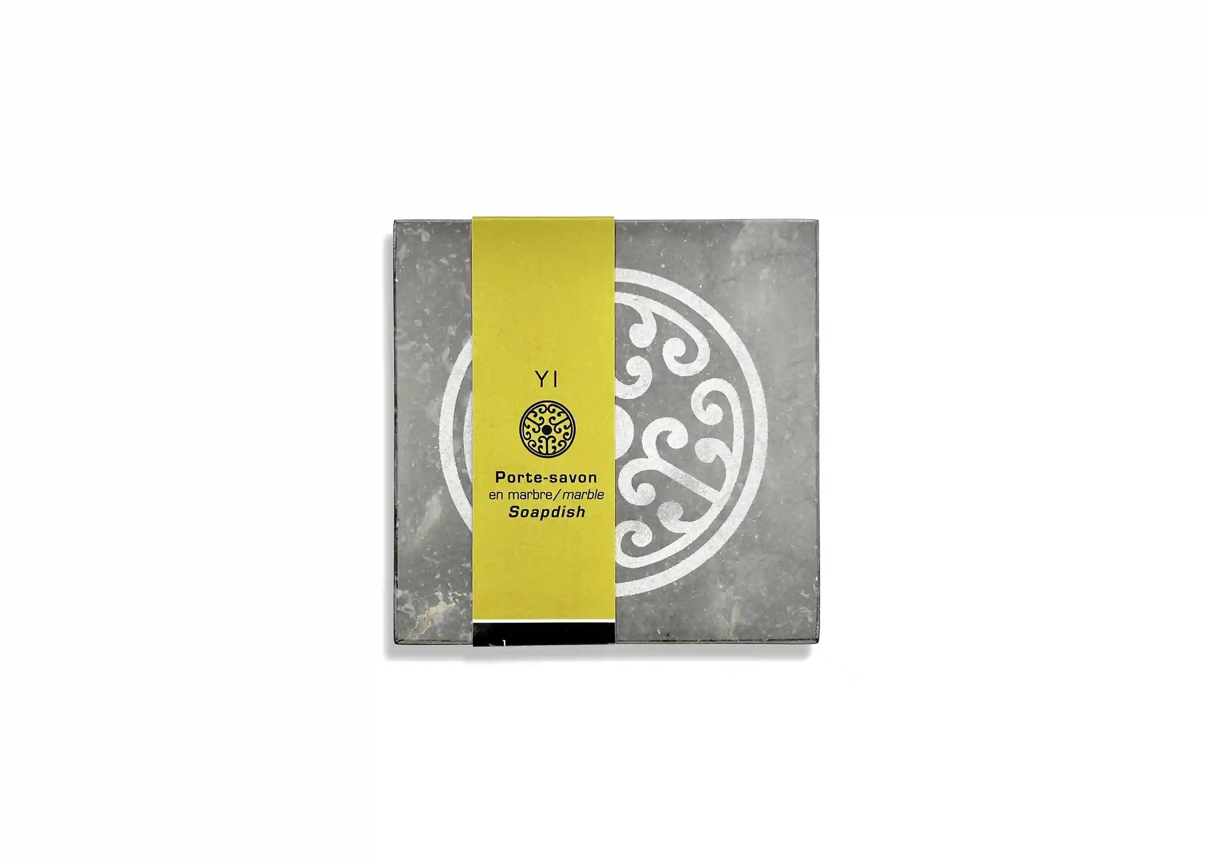 Porte-savon en marbre noir modèle Yi de la marque Karawan authentic avec son liseré packaging, photo prise sur fond blanc
