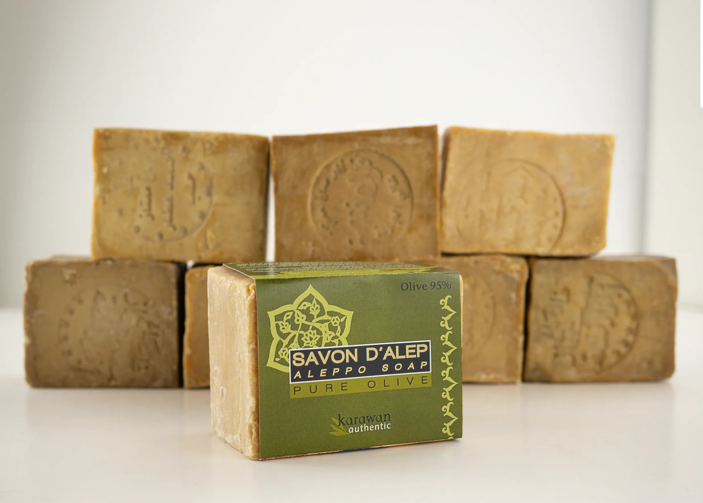 Aleppo soap in a band, and an assortment of bar soaps