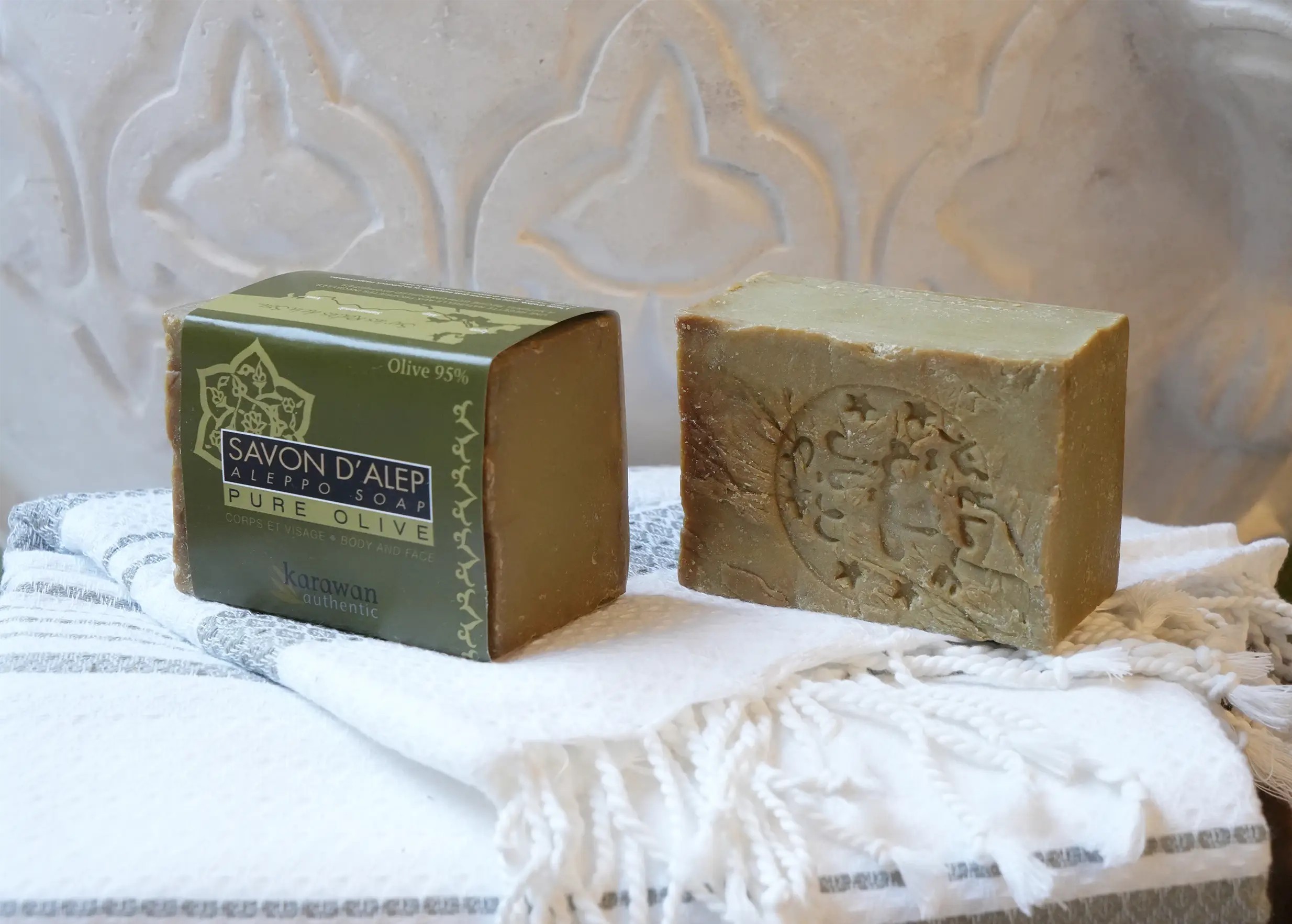 Pure Aleppo olive oil soap in a band out of its packaging