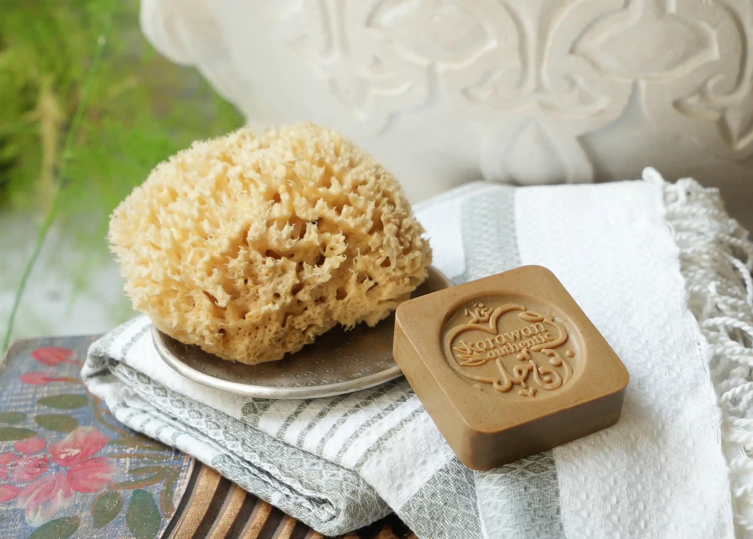 Aleppo soap bar made with Karawan pattern and natural sea sponge