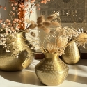 Grand vase déco coloris doré mat, à la finition martelée